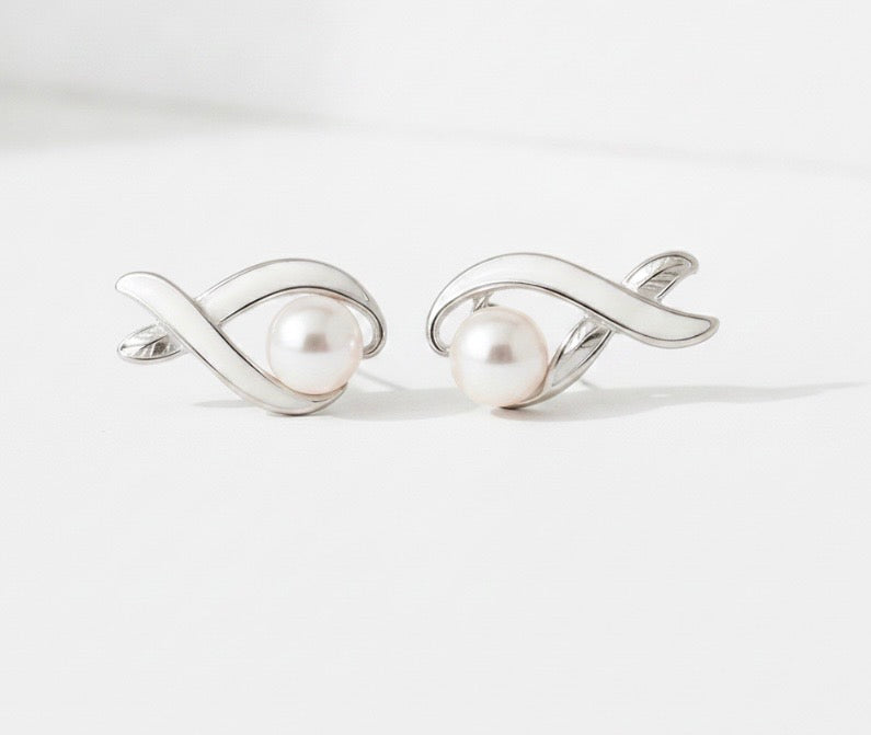 Elegant Pearl Earrings of Woman