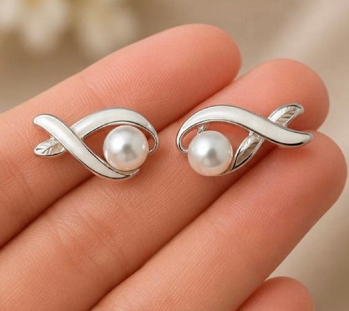 Elegant Pearl Earrings of Woman